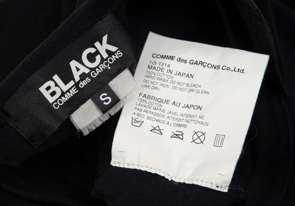 ブラックコムデギャルソンBLACK COMME des GARCONS ロゴプリントフード付きTシャツ 黒黄S K-97121_014