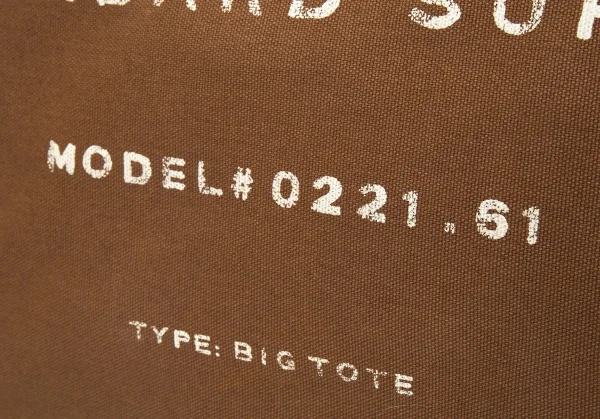 マークバイマークジェイコブスMARC by MARC JACOBS ロゴペイントキャンバスラージトートバッグ 茶 K-97492_004