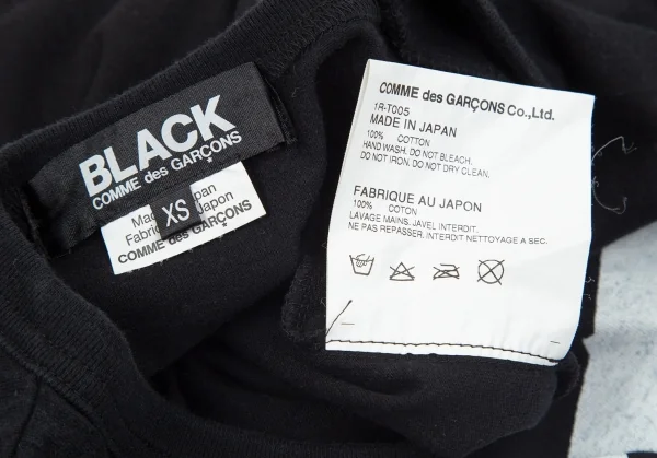 ブラックコムデギャルソンBLACK COMME des GARCONS リボンプリントTシャツ 黒XS K-97844_011