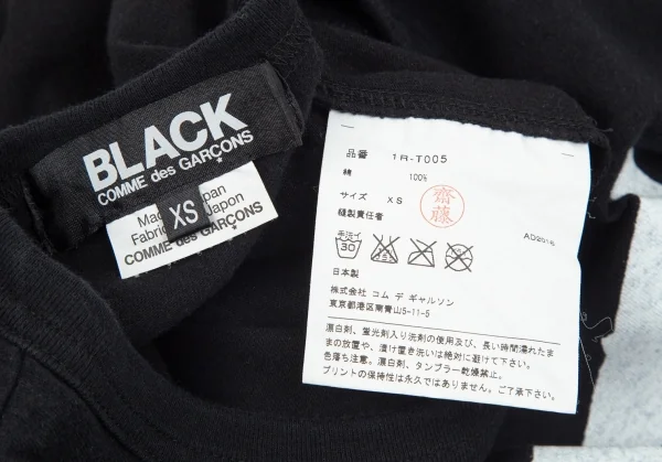 ブラックコムデギャルソンBLACK COMME des GARCONS リボンプリントTシャツ 黒XS K-97844_012