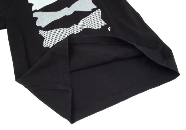 ブラックコムデギャルソンBLACK COMME des GARCONS リボンプリントTシャツ 黒XS K-97844_008