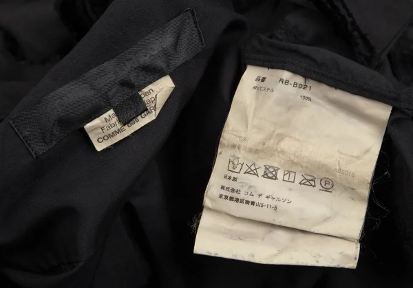コムコム コムデギャルソンCOMME des GARCONS 袖裁ち切りフリルデザインロングシャツ 黒S K-101703_018