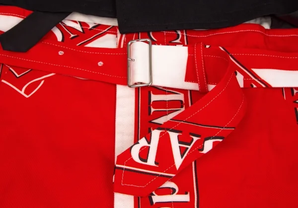 コムデギャルソン オムプリュスCOMME des GARCONS HOMME PLUS ロゴ総柄ドッキングポンチョコート 黒赤白L K-103559_009
