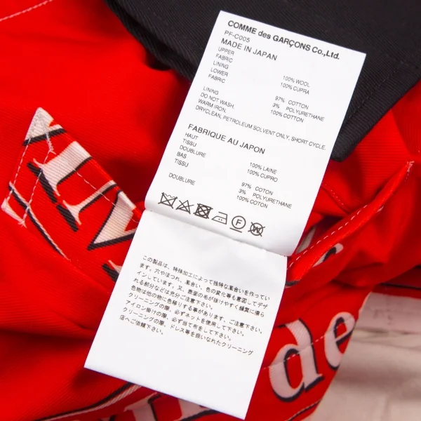 コムデギャルソン オムプリュスCOMME des GARCONS HOMME PLUS ロゴ総柄ドッキングポンチョコート 黒赤白L K-103559_018