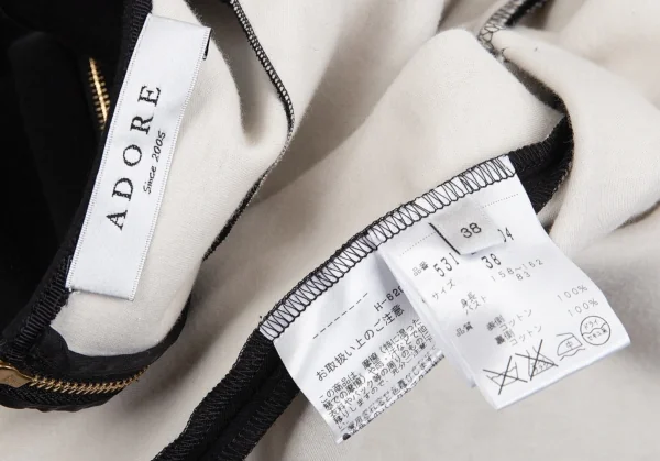 アドーアADORE ボンディングフレアシルエットトップス 黒38 K-104426_014