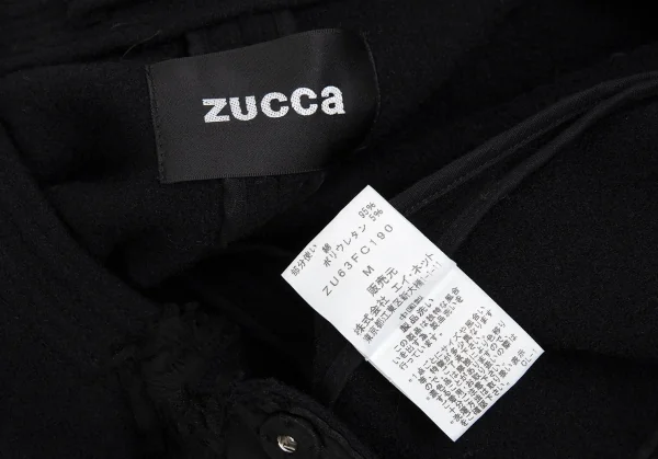 ズッカzucca ウールフロントフリルスナップボタンノーカラージャケット 黒M K-104578_014