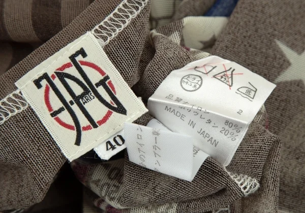 ジャンポールゴルチエJean Paul GAULTIER PARIS グラフィックプリントパワーネットカットソー ベージュモカ40 K-105607_013