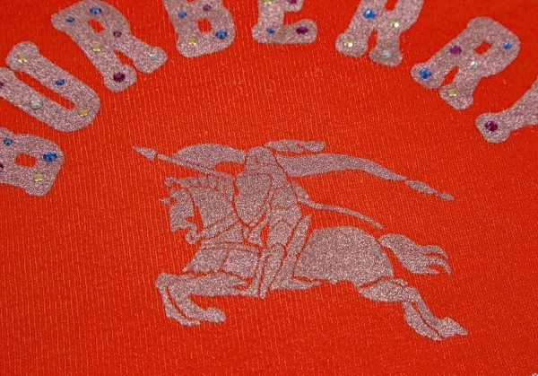 バーバリー ブルーレーベルBURBERRY BLUE LABEL グリッターカレッジロゴプリント7分袖スウェット オレンジM K-111356_010