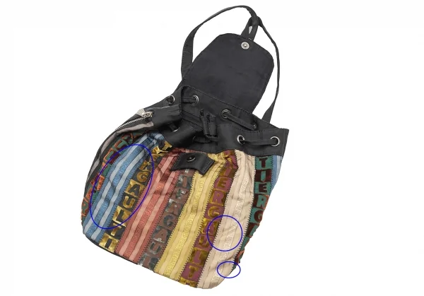 ジャンポールゴルチエJean Paul GAULTIER ロゴマルチストライプミニリュックサック 黒マルチ K-113398_010