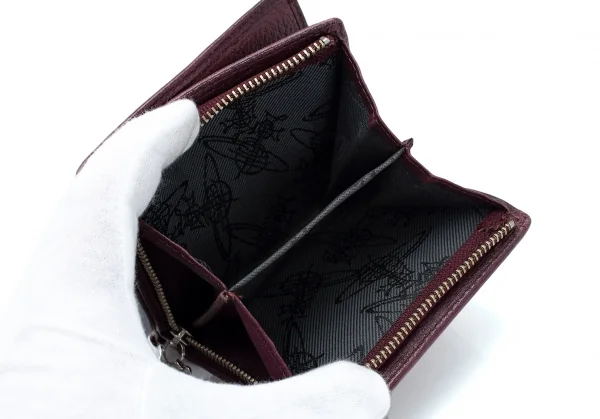ヴィヴィアンウエストウッドVivienne Westwood オーブチャーム付きラウンドジップ財布 赤茶 K-114161_010