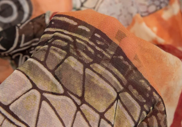 ジャンポールゴルチエ ファムJean Paul GAULTIER FEMME グラフィックプリントパワーネットスカーフスリーブトップス オレンジ40 K-114622_013