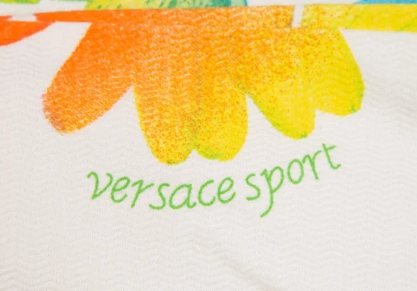 ヴェルサーチスポーツVERSACE SPORT カラフルフラワープリントフレアパンツ 白マルチ40 K-116808_012