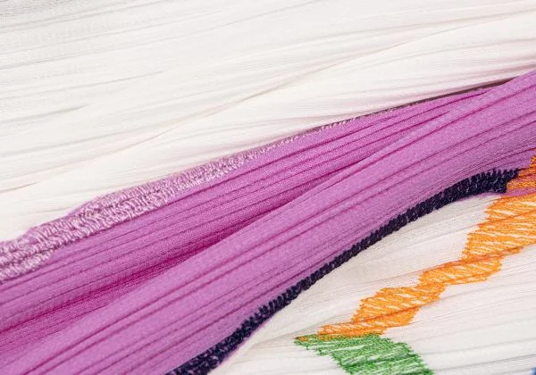 PLEATS PLEASE COAST Graphic Curve Embroidered Sleeveless Shirt K-140174_012