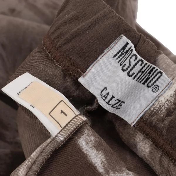 モスキーノMOSCHINO CALZE ポリストレッチ総柄レギンスパンツ モカオフ1 K-154665_011