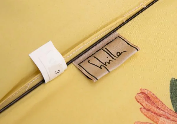 シビラSybilla フローラルプリント折りたたみ傘 黄オレンジ他 K-154927_010