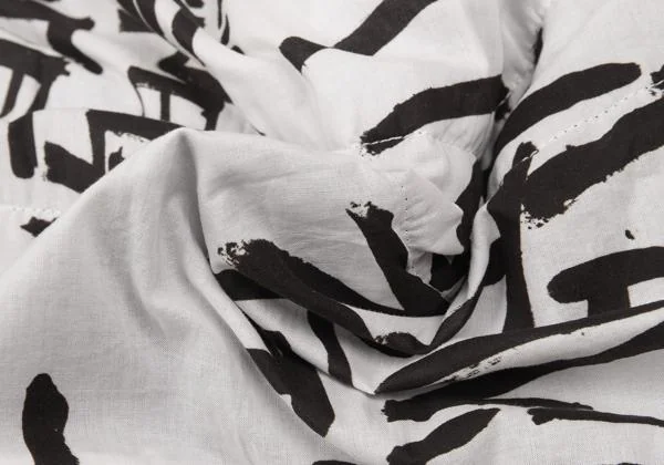 COMME des GARCONS Multiple Hem Lettering Print Voluminous Skirt K-156700_011