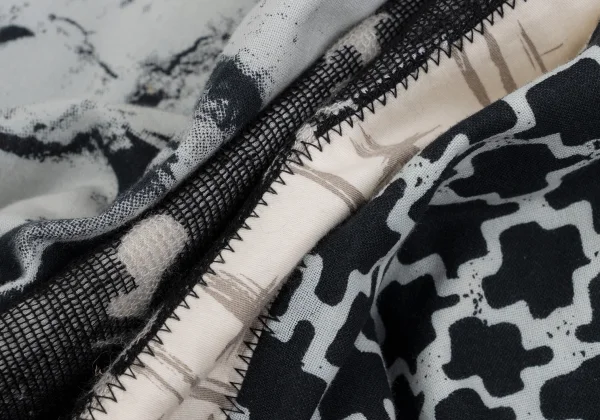 ISSEY MIYAKE PERMANENTE Printed Mixed-material Pants K-169022_012