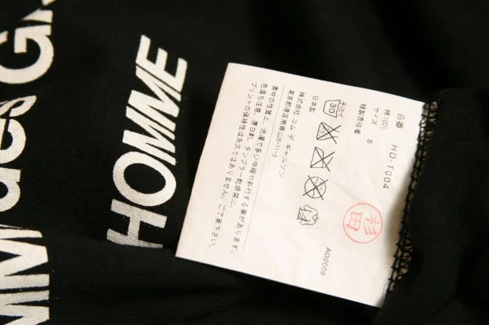 新品!コムデギャルソン オムCOMME des GARCONS HOMMEバックプリントT
