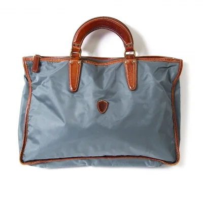 フェリージFelisi レザーパイピングナイロンハンドバッグ