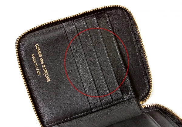 コムデギャルソンCOMME des GARCONS 型押しレザーラウンドジップ