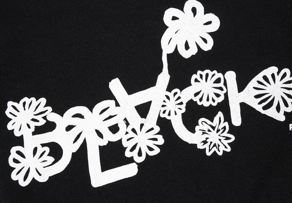 ブラックコムデギャルソンBLACK COMME des GARCONS フラワーロゴプリントTシャツ 黒S K-75401_004