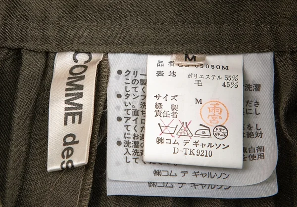 コムデギャルソンCOMME des GARCONSエステルウールフェードプリーツハーフパンツ カーキM K-85020_012