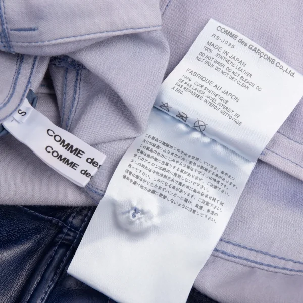 コムコム コムデギャルソンCOMME des GARCONS フェイクレザーノーカラートラックジャケット 青S K-89896_019