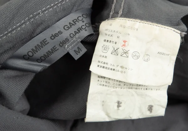コムコム コムデギャルソンCOMME des GARCONSポリ斜行切替ロングジャケット グレーM K-92744_018