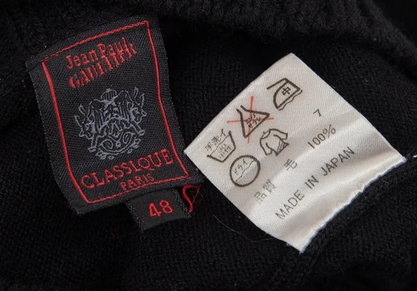 ジャンポールゴルチエ クラシックJean Paul GAULTIER CLASSIQUE 裾ワンポイントハイネック切替ニット 黒48 K-95784_014