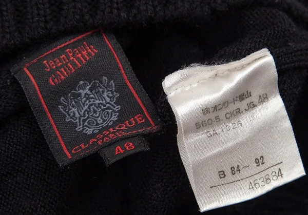 ジャンポールゴルチエ クラシックJean Paul GAULTIER CLASSIQUE 裾ワンポイントハイネック切替ニット 黒48 K-95784_015